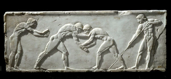 Base of a kouros statue : fighting wrestlers. 510-500 BC ( marble bas relief)