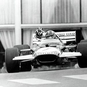 1970 Monaco Grand Prix. Monte Carlo, Monaco. 7-10 May 1970. Graham Hill (Lotus 49C-Ford Cosworth) with an early on-board television camera. TV. World Copyright: LAT Photographic Ref: Autosport b&w ptint